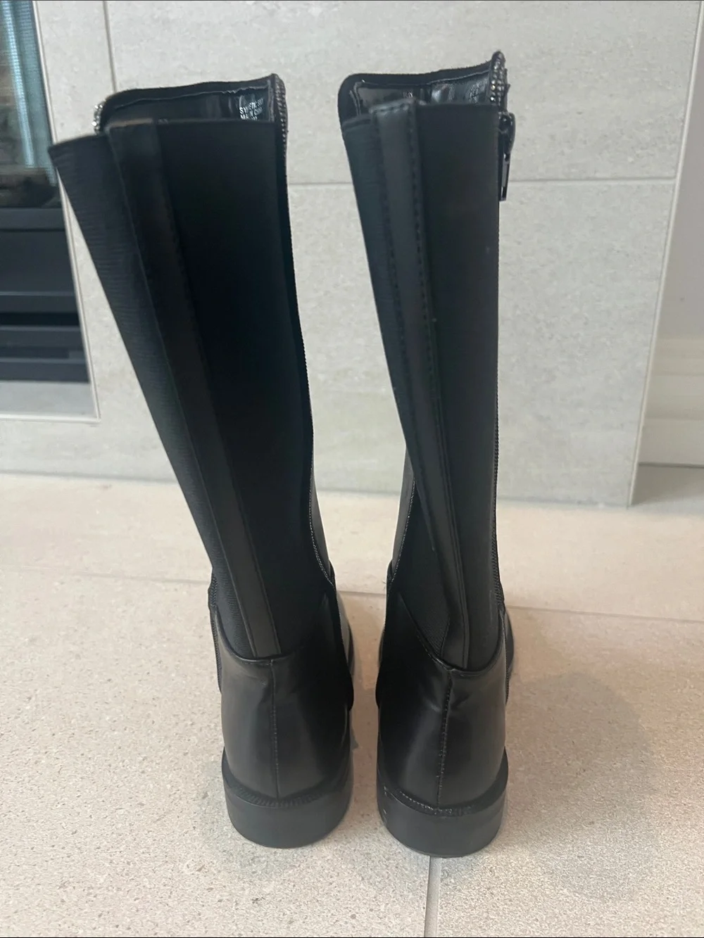 Tall girls black riding boot